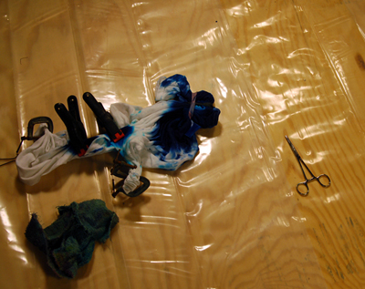 Undyed areas pleated and clamped